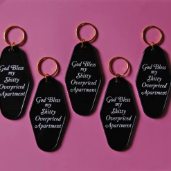 A Shop Of Things Accessories God Bless My Shitty Apartment Keychain